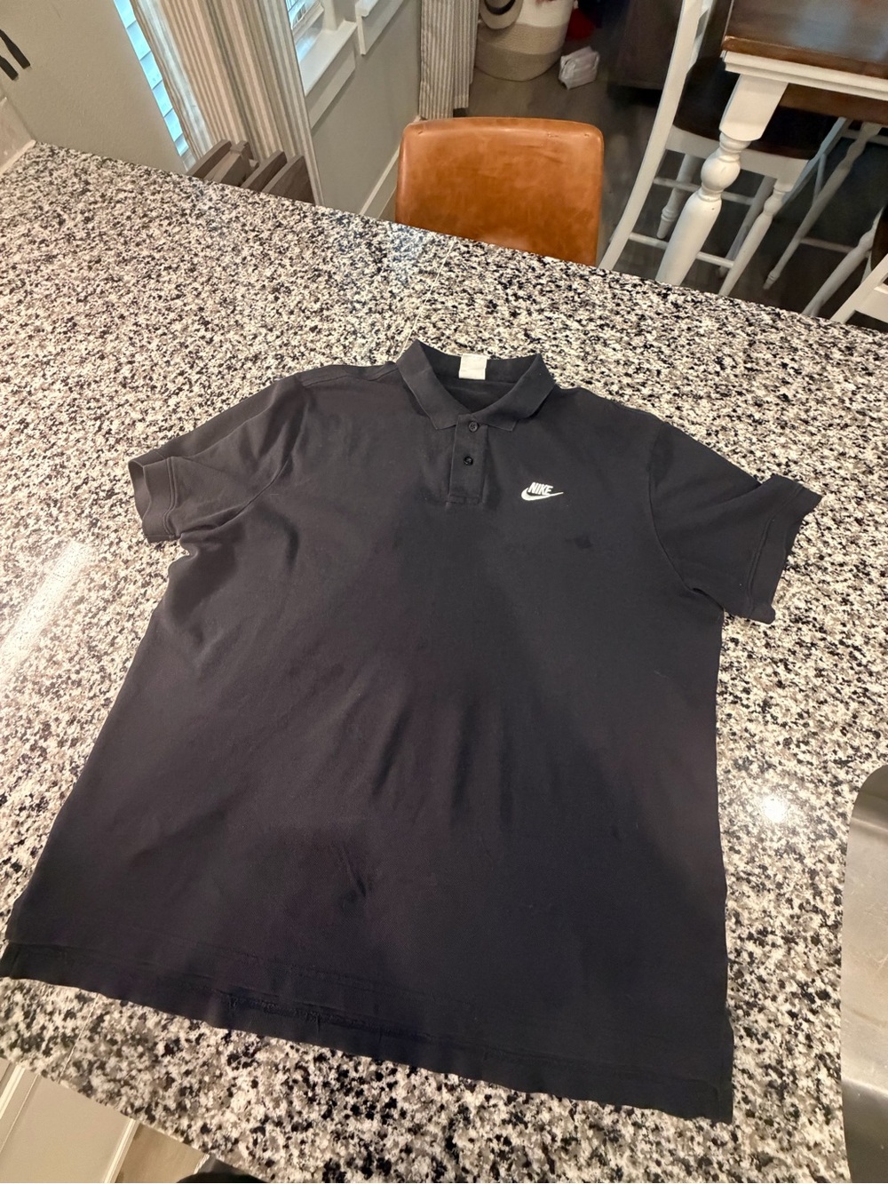 Nike Men’s Black Polo with White Swoosh